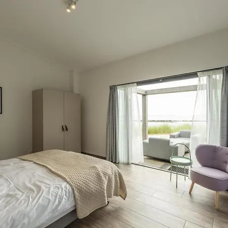 77 - Beachfront | Directly On The With Views Over The Water * Ouddorp